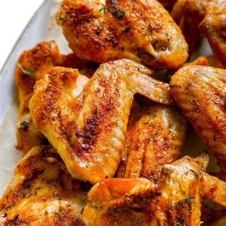 Are cooked chicken wings OK for dogs?