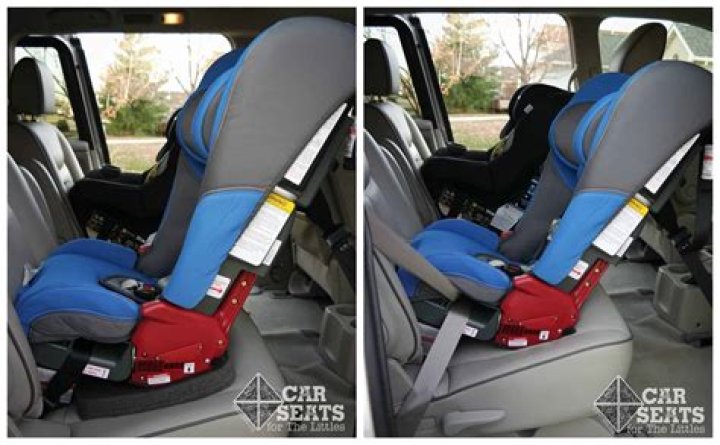 Can Diono Rainier touch front seat?