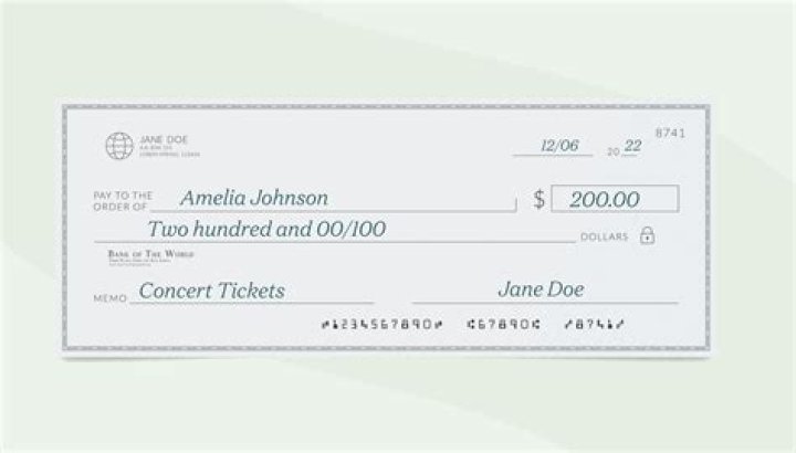 Can I use checks with my old name?