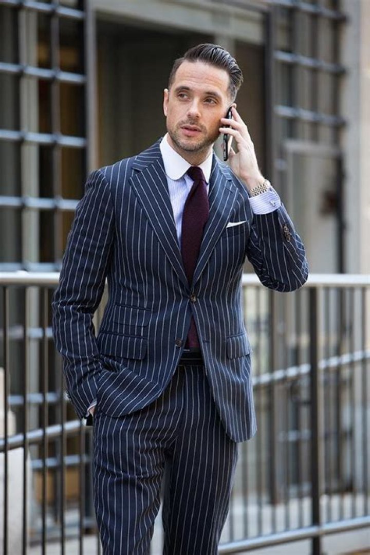 Can you wear a striped shirt with a check suit?
