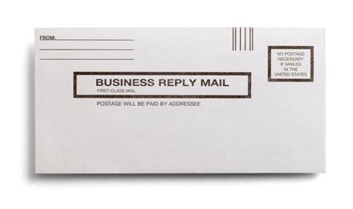 Do I put my address on a business reply envelope?