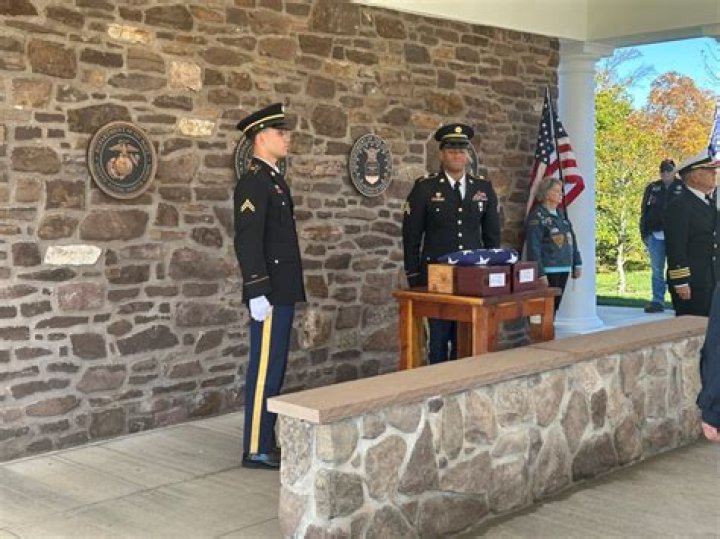 Do they bury veterans standing up?
