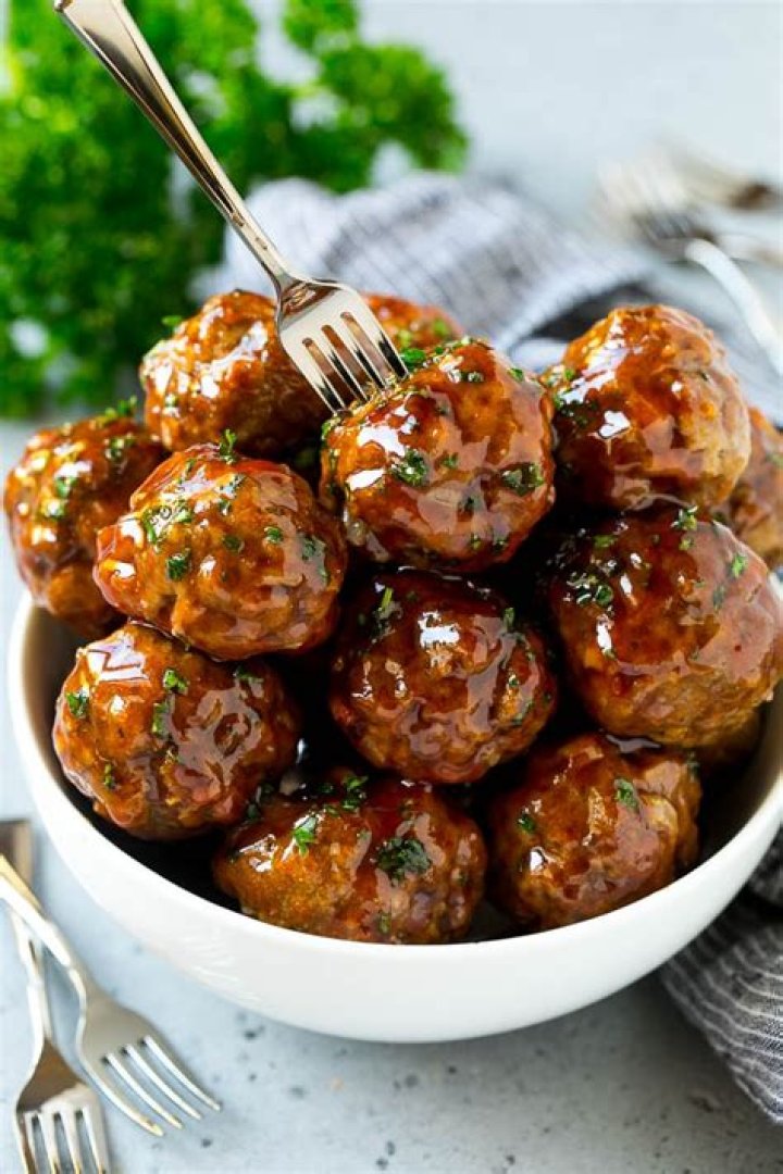 Do you have to brown meatballs before cooking in sauce?