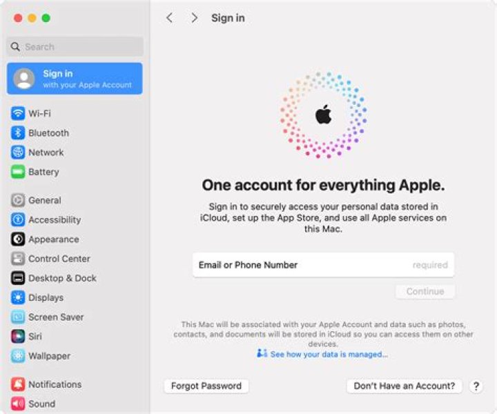 How do I add a second iTunes account to my iPhone?