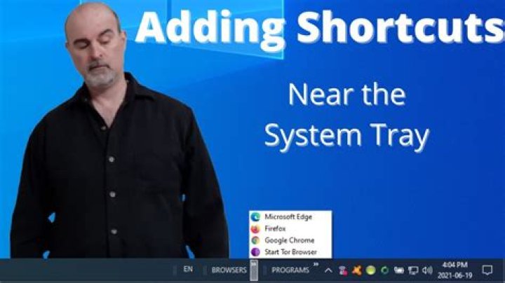 How do I add programs to Windows 10 system tray?