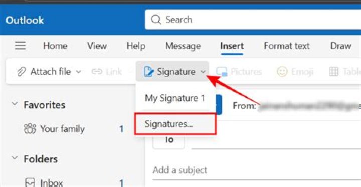 How do I change my signature in Outlook webmail?