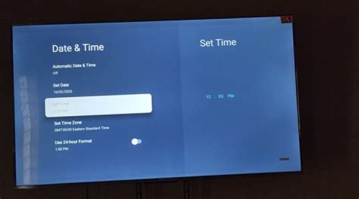 How do I change the time on my TCL Smart TV?