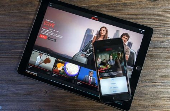 How do I download a movie to my iPad?