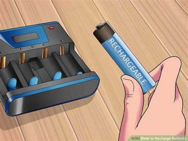 How do I recharge my camera battery?