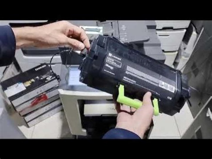 How do I reset my Lexmark ink cartridge?