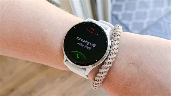 How do you answer the phone on a watch?