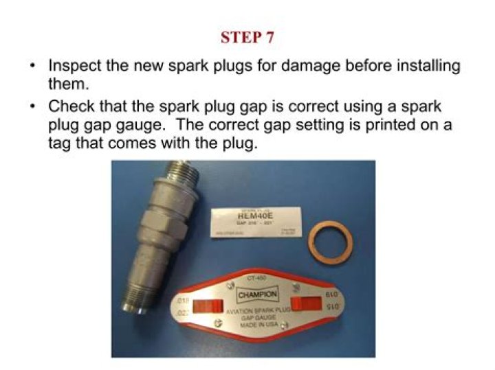 How do you check an aircraft spark plug?