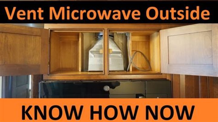 How do you clean an exhaust fan in the microwave?
