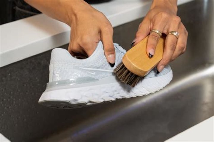 How do you clean black sneakers?