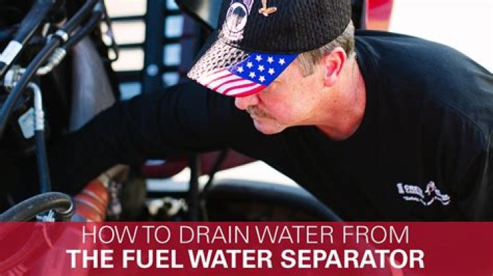 How do you drain water from a fuel water separator?