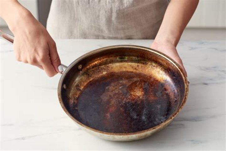 How do you get burnt stuff off a glass pan?