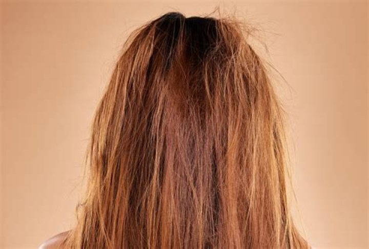 How do you get rid of frizzy hair after blow drying?