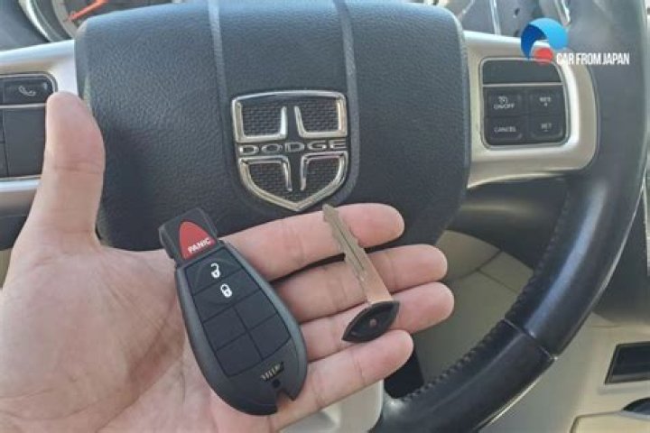 How do you program a key fob for a 2009 Dodge Caravan?