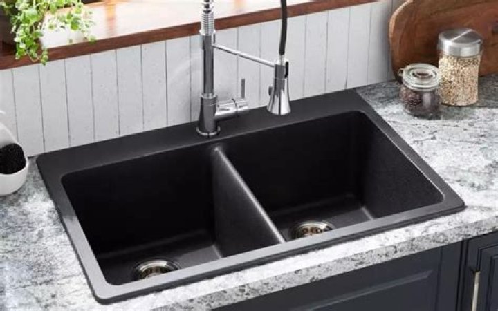 How do you remove stains from a granite composite sink?