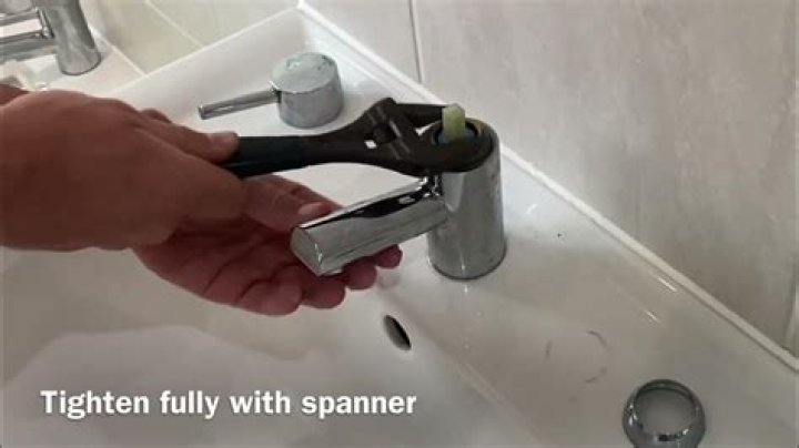 How do you remove the blade from a mixer jar?