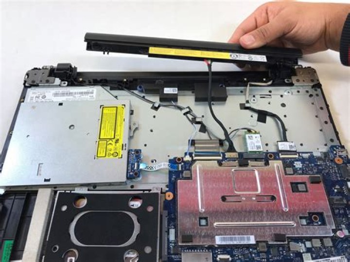 How do you take the battery out of a Lenovo Ideapad 110?