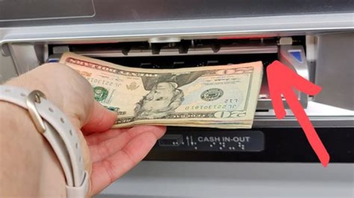 How does ATM dispense cash?