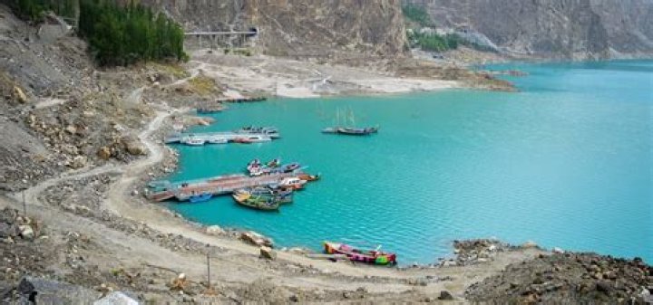 How far is attabad lake from Islamabad?