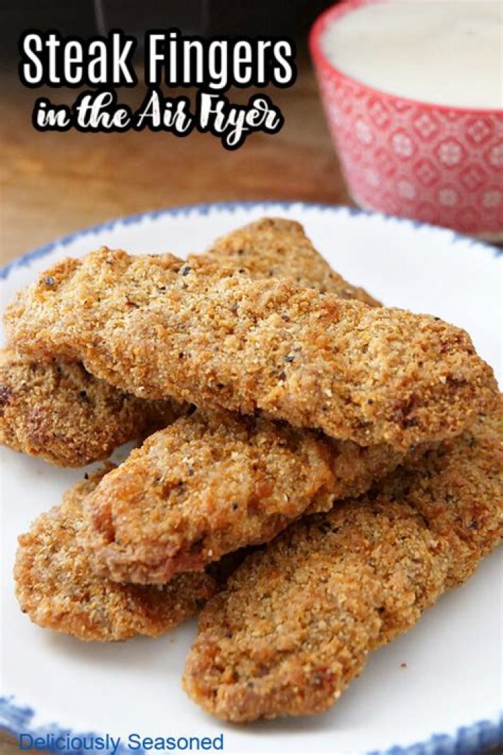 How long do you air fry frozen steak fingers?