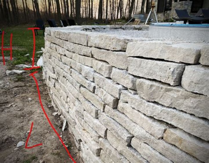 How long does a stone wall take to dry out?