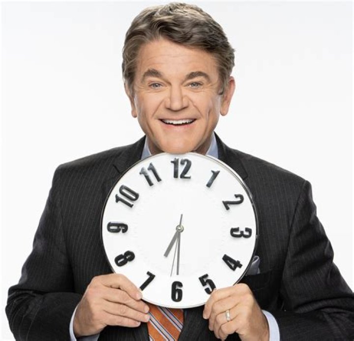 How old is game show host John Michael Higgins?