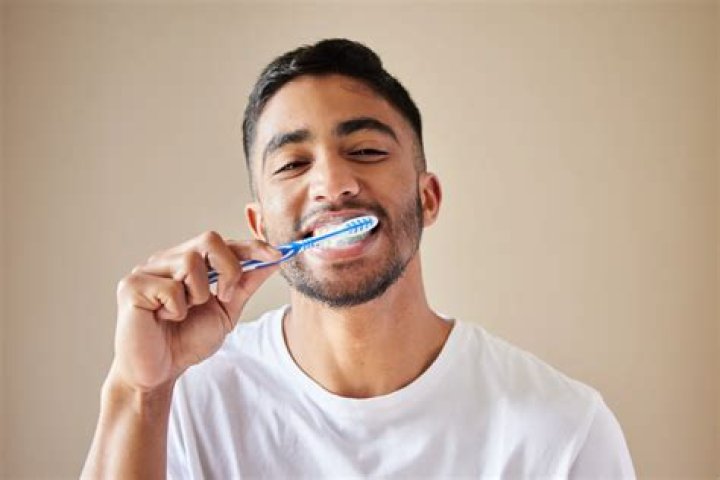 How should a black man brush his beard?