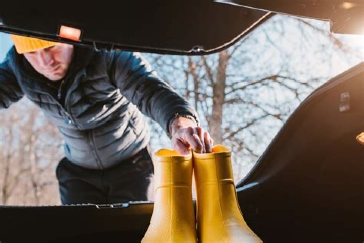 Is driving in Wellington boots illegal?