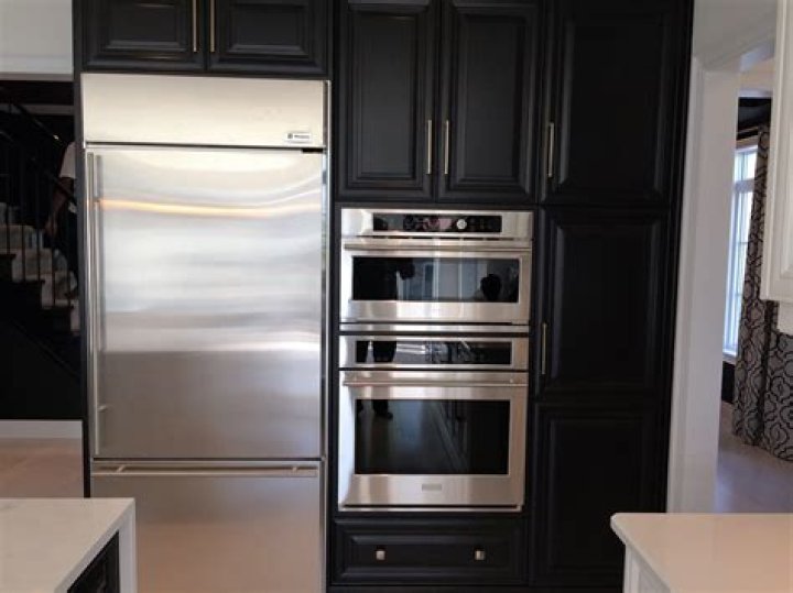 Is it OK to have an oven next to a refrigerator?