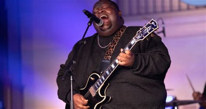 What age did Kingfish start playing guitar?