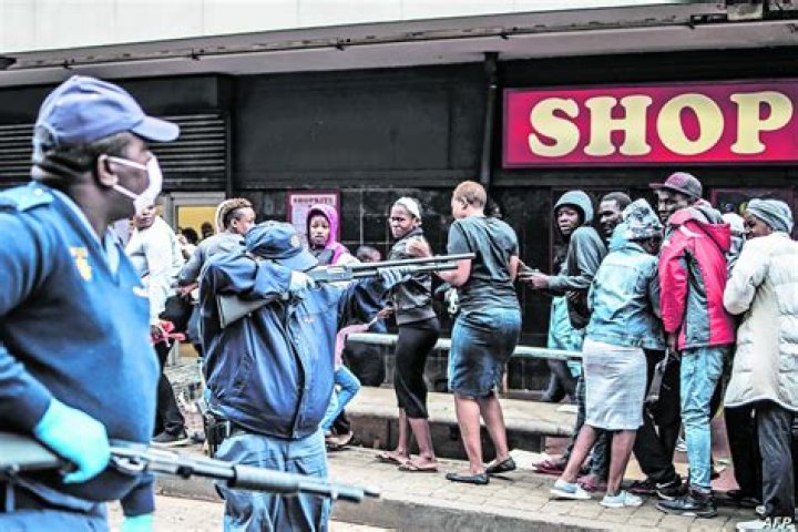 What could be the reason for South Africa to be downgraded to junk status?