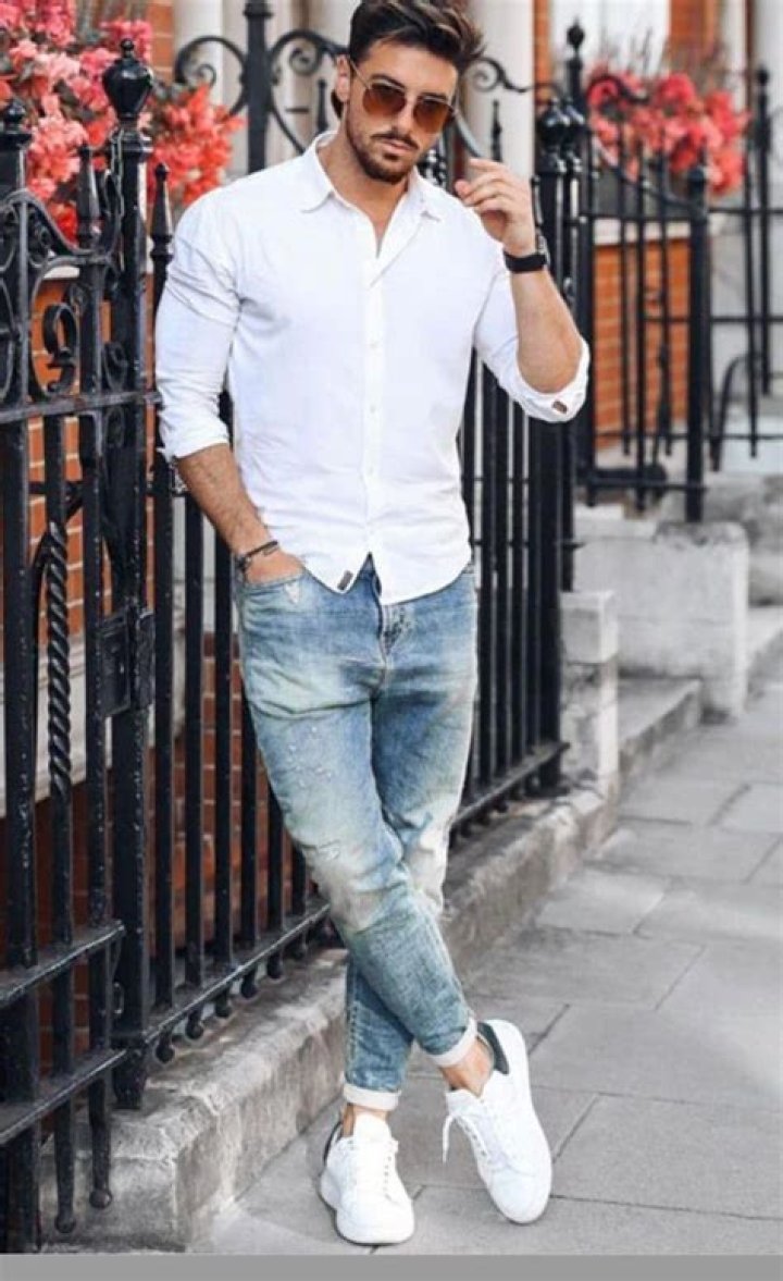 What do men wear with a button down shirt?