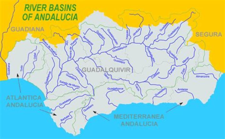 What do the Spanish Rivers Guadalquivir and Guadiana flow into?