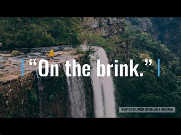 What does hover on the brink mean?
