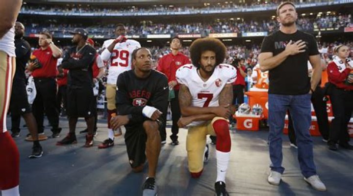 What does taking a knee during the anthem mean?