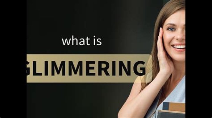 What is the definition of glimmering?