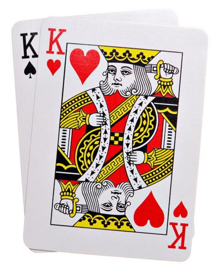 What is the king of hearts holding?