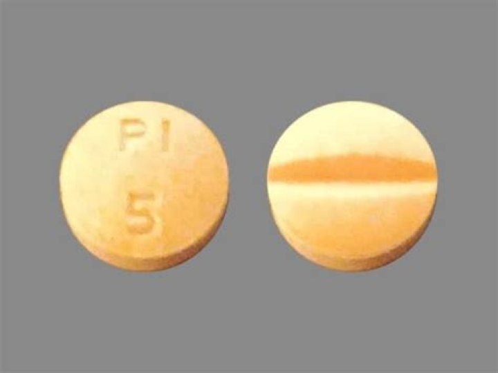 What kind of pill is round orange?