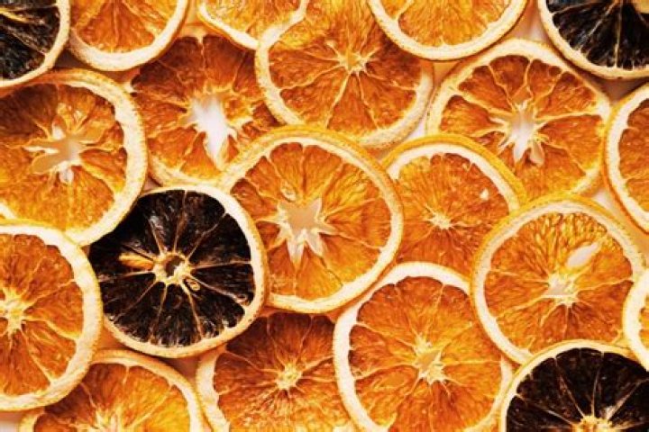 What temperature do you dehydrate oranges at?
