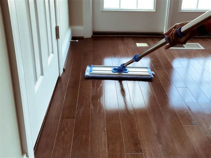When can I clean new hardwood floors?