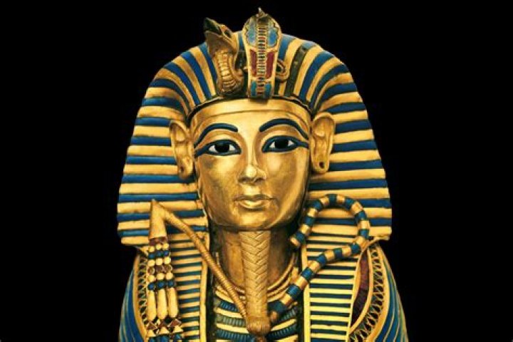 When was King Tut's body returned to its original site?