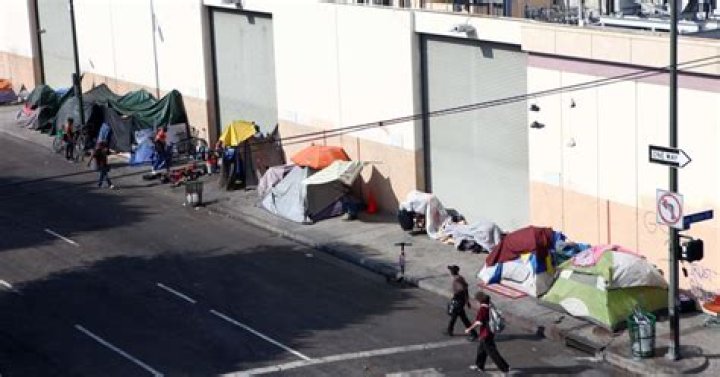 Where is Skid Row in relation to the Cecil Hotel?