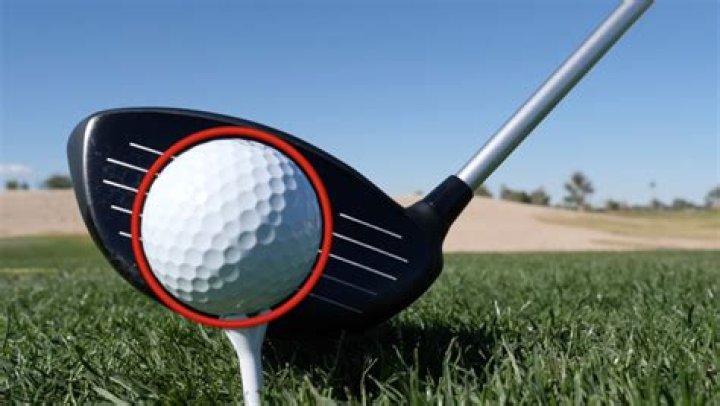 Where should the ball hit the driver face?