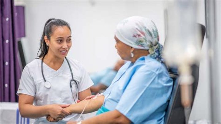 Who do oncologists work with?