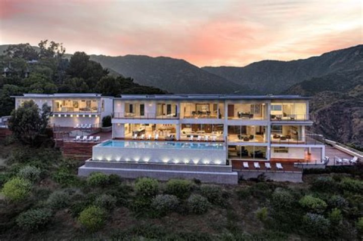 Who owns the castle in Malibu?