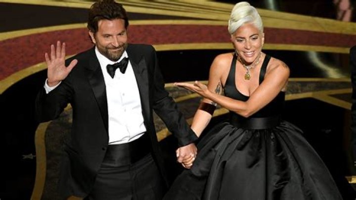 Who was with Bradley Cooper at the Oscars?